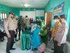 Pelaksanaan Vaksinasi Covid-19 Dosis Kedua bagi Lansia di Desa Munggung